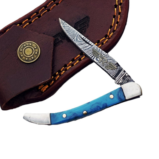 Ruddock Bros slim folding pocket knife with resin plastic handle and Damascus steel blade and leather sheath Ruddock El Paso Texas