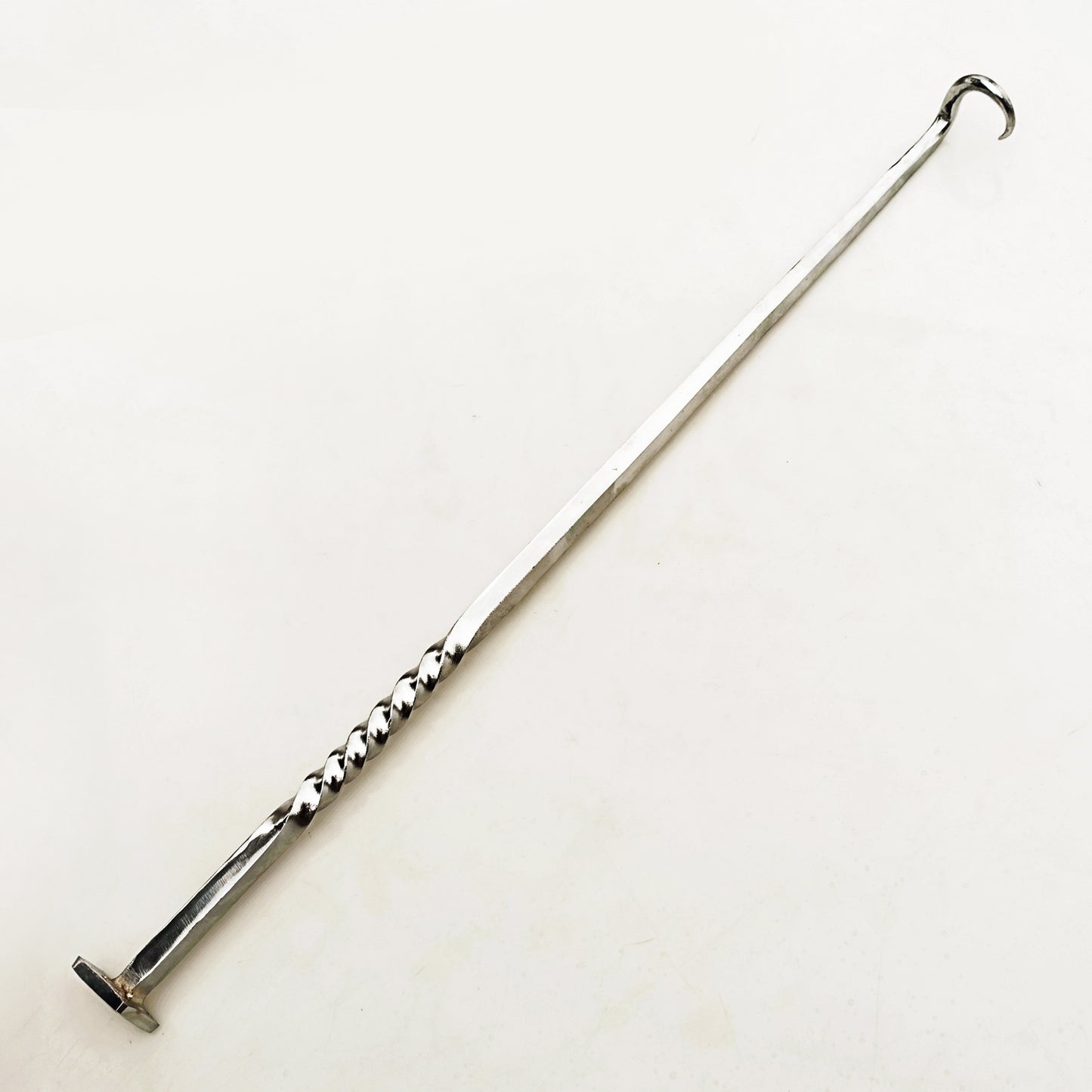 Stainless Steel pigtail meat flipper by Ruddock Bros El Paso Texas Ruddock Shirts