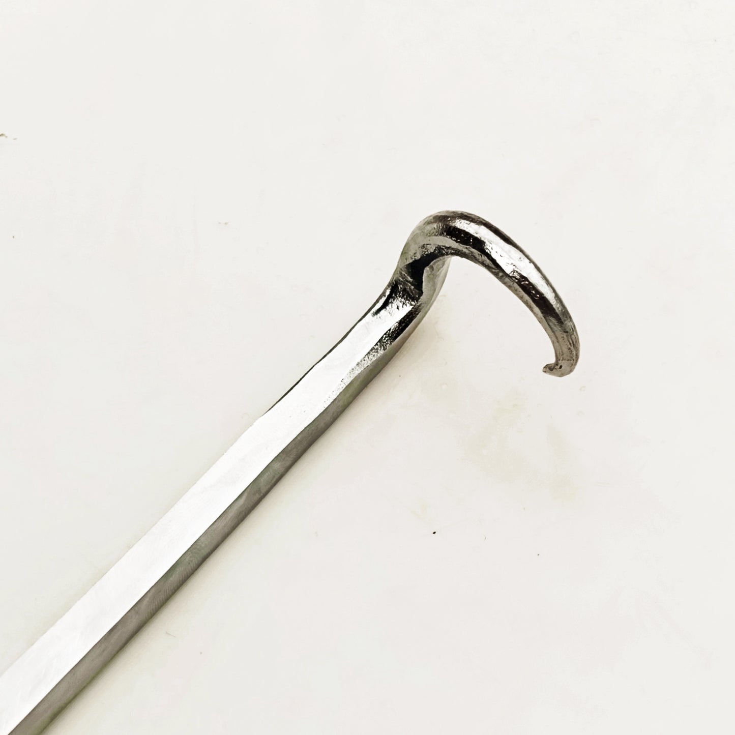 Stainless Steel pigtail meat flipper by Ruddock Bros El Paso Texas Ruddock Shirts