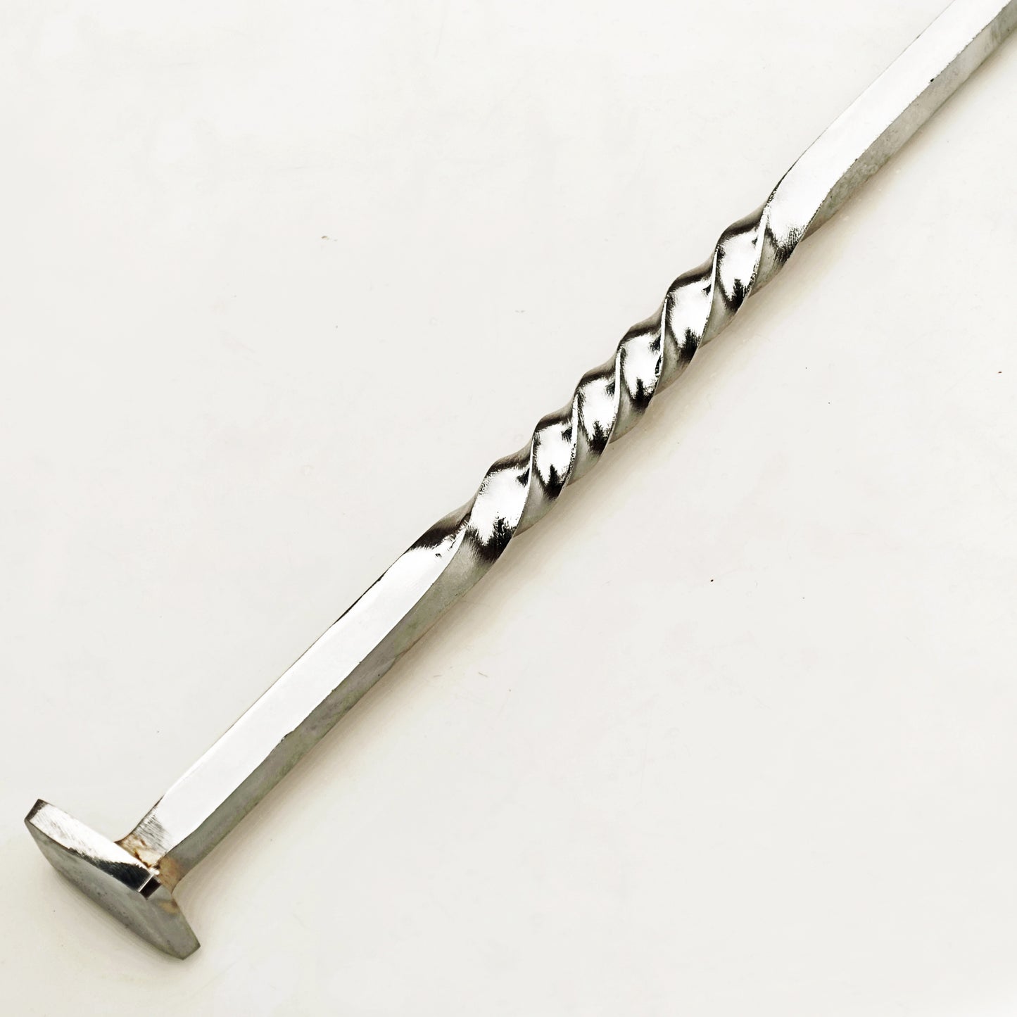 Stainless Steel pigtail meat flipper by Ruddock Bros El Paso Texas Ruddock Shirts