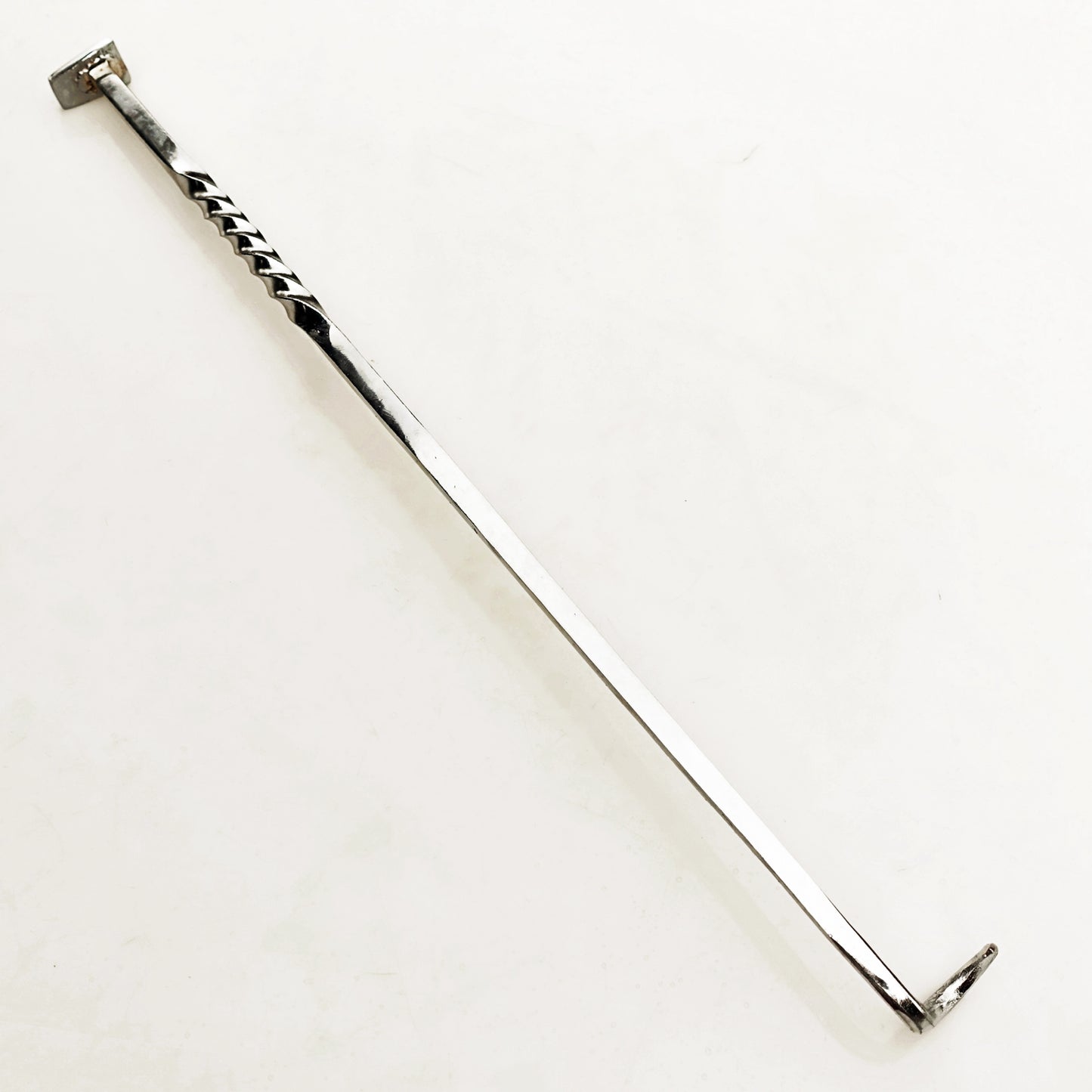 Stainless Steel pigtail meat flipper by Ruddock Bros El Paso Texas Ruddock Shirts