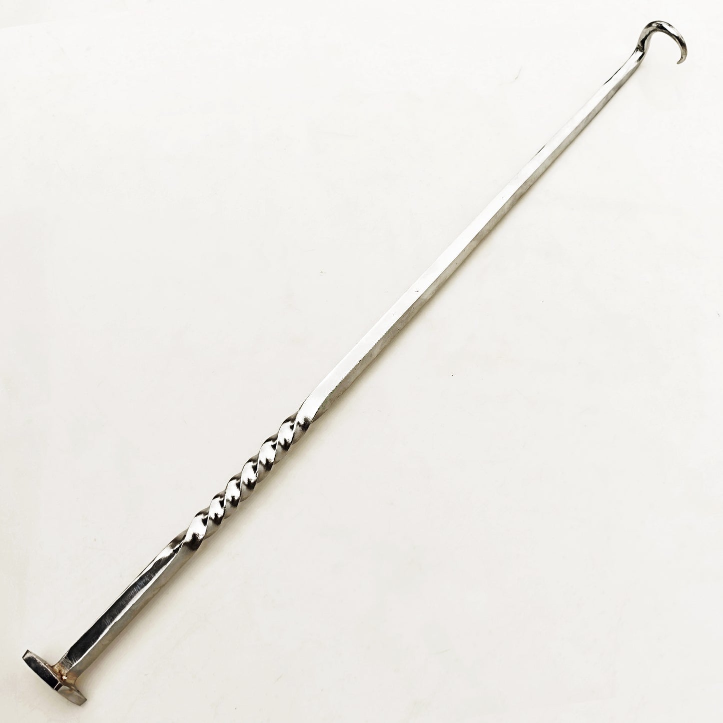 Stainless Steel pigtail meat flipper by Ruddock Bros El Paso Texas Ruddock Shirts