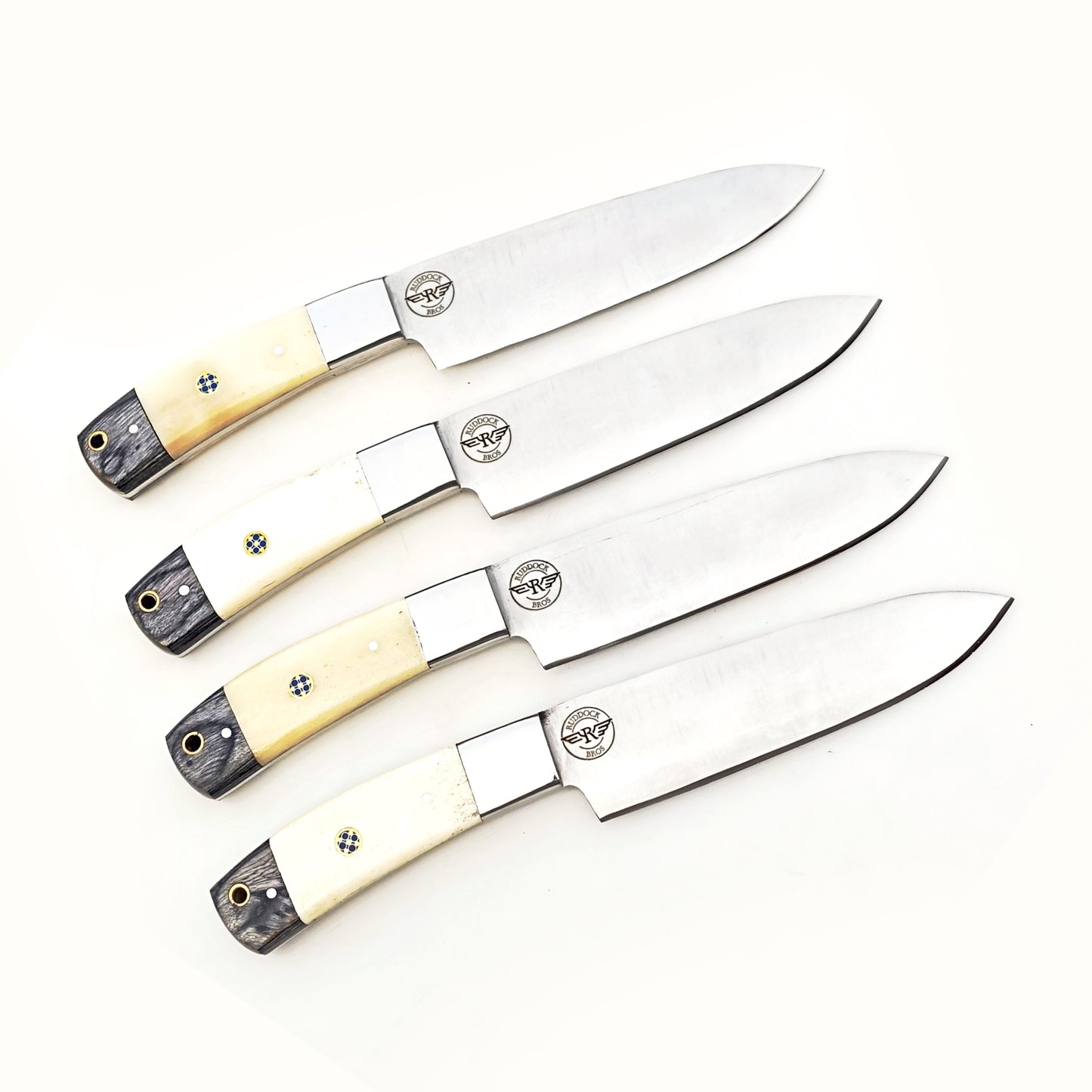 Ruddock Bros 4 piece steak knife set with natural horn and hardwood handle and stainless steel blade Ruddock El Paso Texas