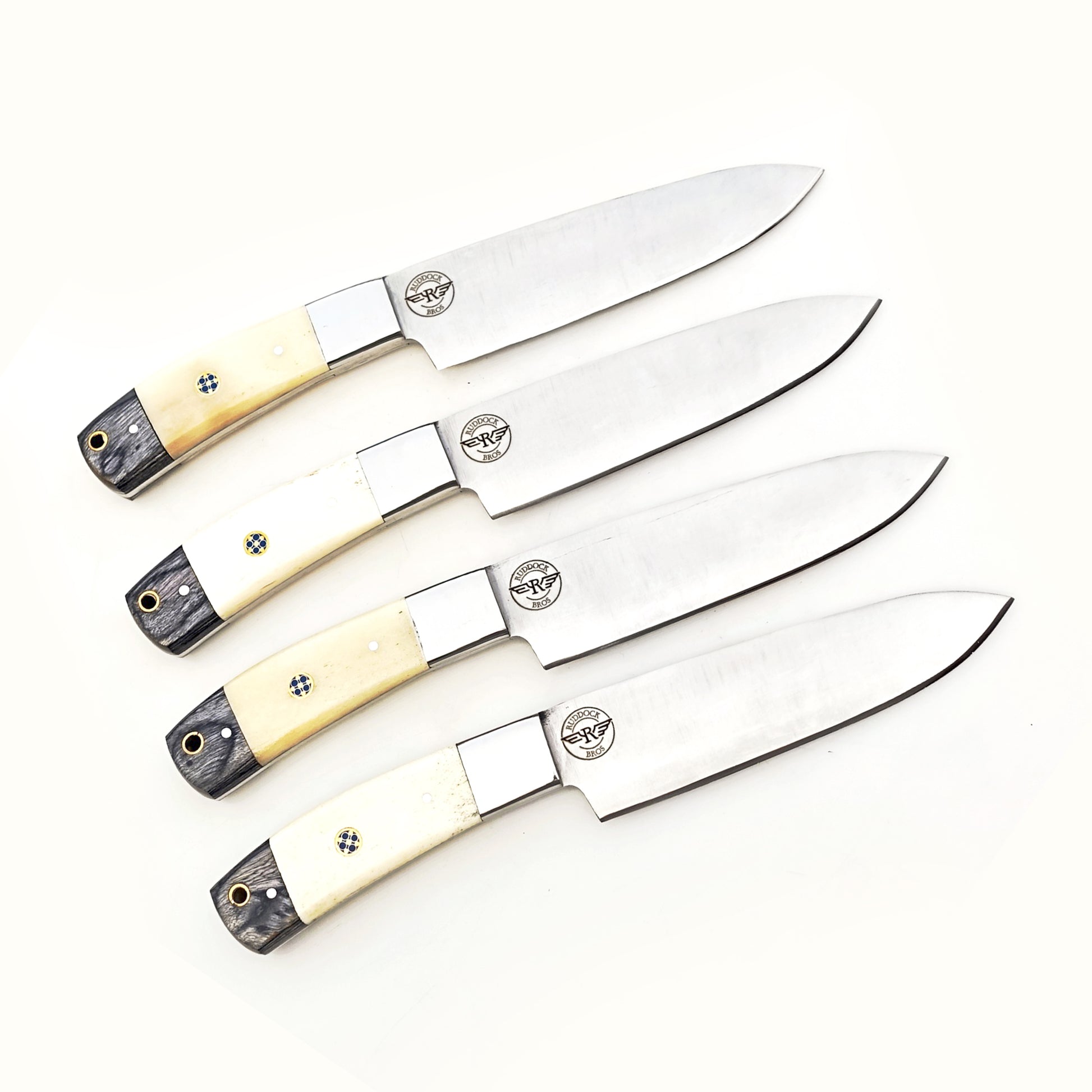 Ruddock Bros 4 piece steak knife set with natural horn and hardwood handle and stainless steel blade Ruddock El Paso Texas