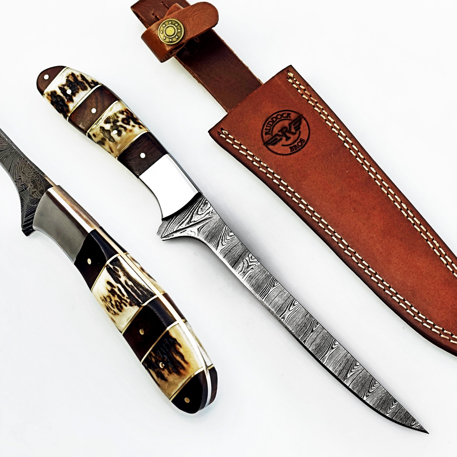 Damascus steel fillet knife by Ruddock Bros with horn and hardwood handle