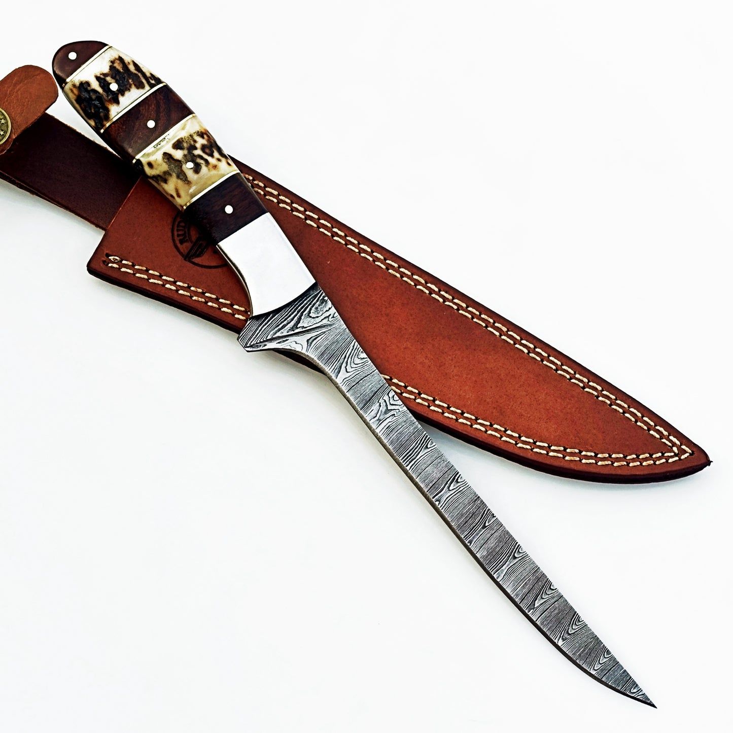 Damascus steel fillet knife by Ruddock Bros with horn and hardwood handle