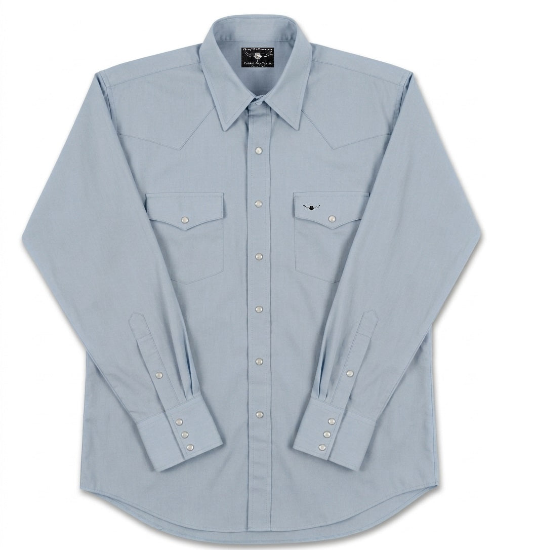  solid light blue shirt by Flying R Ranchwear with two pockets and flaps and snap closures. Made in USA
